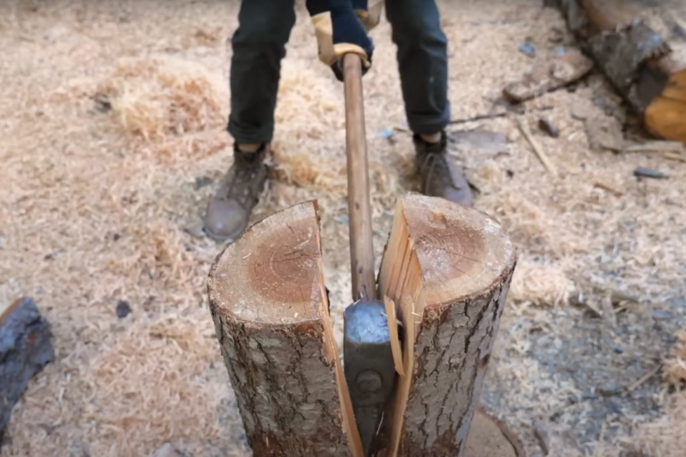 Splitting Wood With Axe